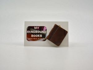 Tiny Leather Journals - Designer Craft Shop Made in Canada. Made in Nova Scotia. Made in the Maritimes. Artisan | Fine Craft | Pottery | Ceramics | Jewellery | Jewelry | Art | Bookbinding | Printmaking | Leather | Home | Decor | Local | Halifax | Dartmouth | HRM | Gifts | Handmade | Handcrafted | Atlantic | Gallery | Shop | Unique | One of a Kind |  OOAK